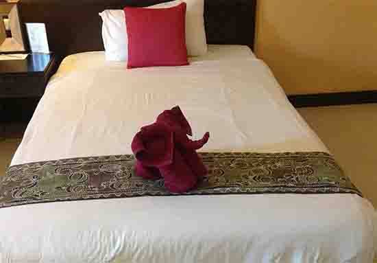 Why Hotels Place a Fabric Strip Across the Bed: The Hidden Purpose of the Bed Runner